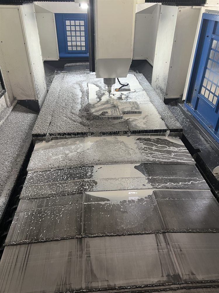 Production process for automotive floor mat tooling and processing